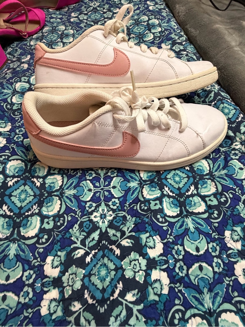 Nike Women's White Sneakers with Pink Swoosh Accent